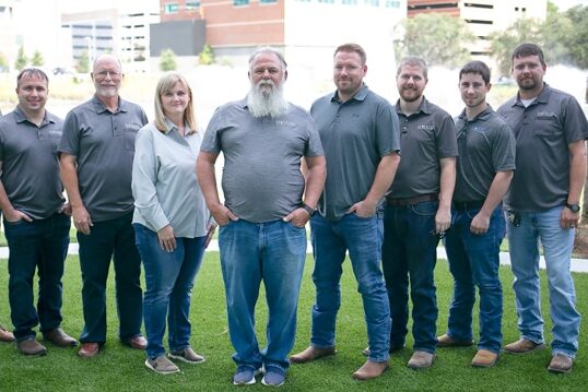 Group of employees smiling